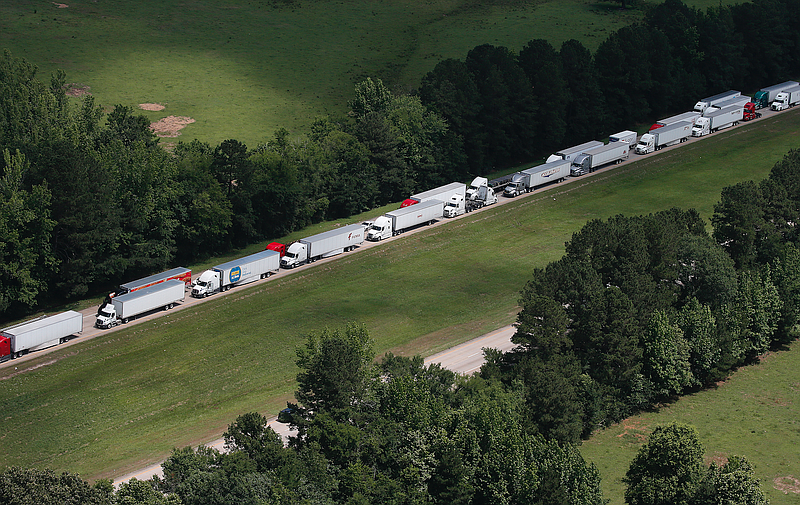 Tractor-trailers were backed up along Interstate 30 near Caddo Valley on Thursday morning. (Arkansas Democrat-Gazette/Tommy Metthe)