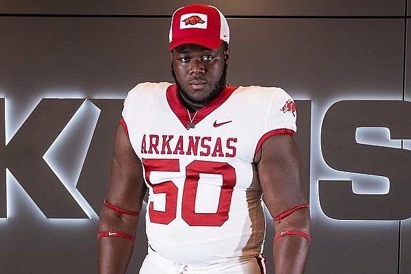 Arkansas improves standing with Tifase after visit