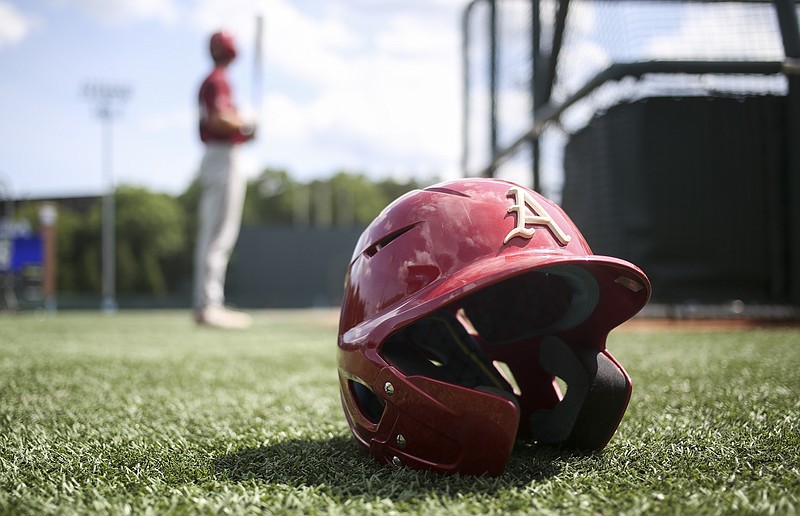 A baseball helmet is shown, Friday, June 10, 2022 during a baseball practice before the NCAA Baseball Super Regional at Boshamer Stadium in Chapel Hill, NC. Check out nwaonline.com/220611Daily/ and nwadg.com/photos for a photo gallery...(NWA Democrat-Gazette/Charlie Kaijo)