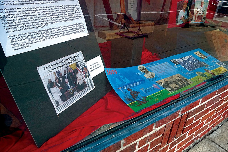 The Kingdom of Callaway Historical Society set up a display in its storefront window on Court Street as part of the area’s recognition of Juneteenth. (Michael Shine/FULTON SUN)