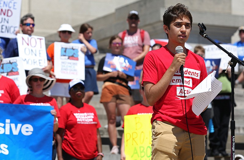 Little Rock Central High School student Zulkifl Qazi addresses the audience at the March for Our Lives rally on the steps of the Arkansas state Capitol on Saturday.
(Arkansas Democrat-Gazette/Colin Murphey)