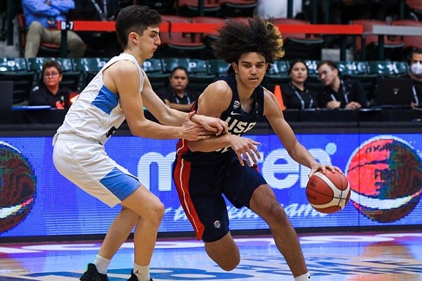 Anthony Black drives the ball against Argentina on June 11, 2022, in the semifinal round at the FIBA U18 Americas Championship in Tijuana, Mexico.