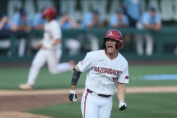 Arkansas Brady Slavens (17) celebrates, Sunday, June 12, 2022 at the end of the 9th inning during the NCAA Baseball Super Regional game 2 at Boshamer Stadium in Chapel Hill, NC. Check out nwaonline.com/220613Daily/ and nwadg.com/photos for a photo gallery.