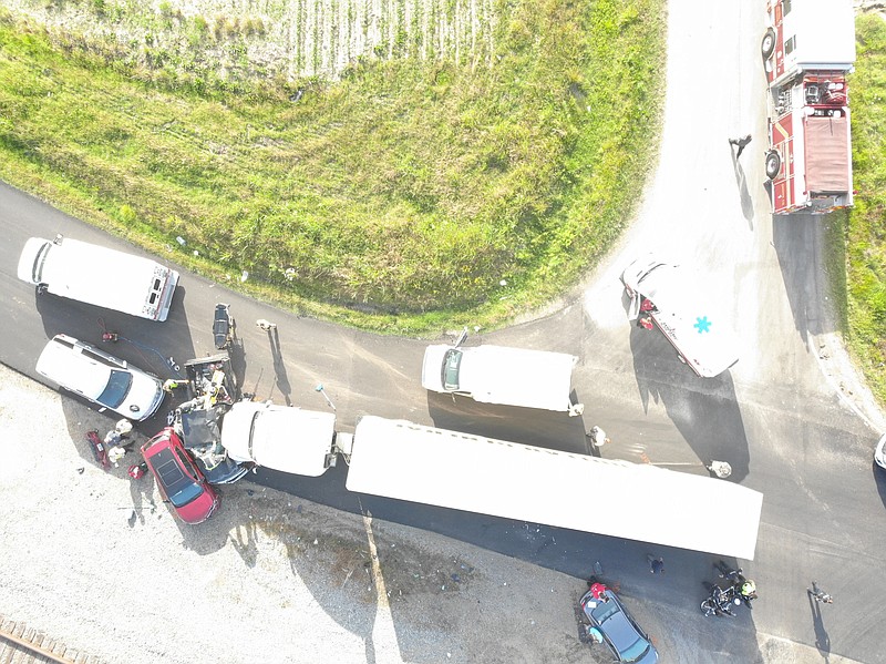 A tractor-trailer failed to yield to a stop sign in Jonesboro, striking a car and pushing it into three other vehicles. (Courtesy of Jonesboro Police Department)