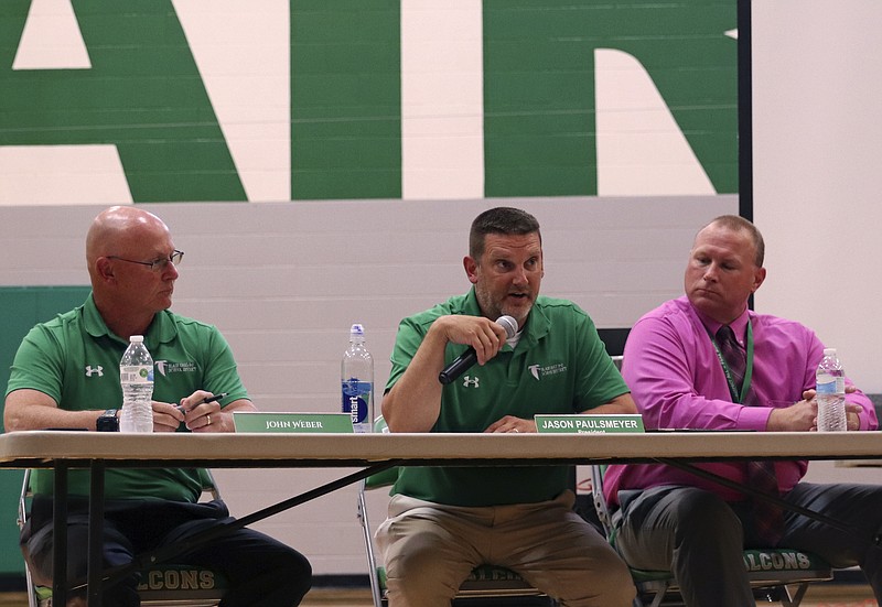 Blair Oaks school officials are shown interacting with community members about Board Policy 2115 on Tuesday, June 14, 2022, at Blair Oaks Intermediate School. (Kate Cassady/News Tribune photo)