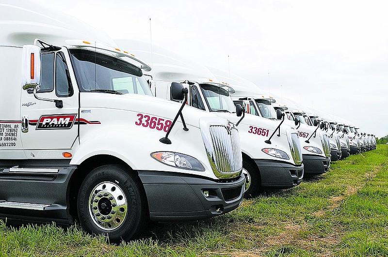 Some of the trucks that Diamond International prepared for P.A.M. Transportation Services Inc. are shown in this undated file photo. (NWA Democrat-Gazette/Anthony Reyes)