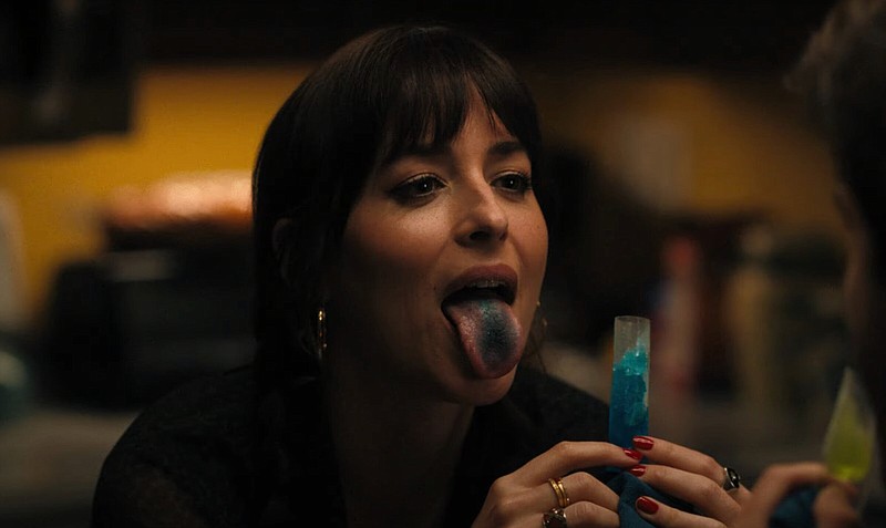 Unhappily engaged Domino (Dakota Johnson) is the mother of an autistic daughter who finds herself platonically pursued by her daughter’s babysitter in Cooper Raiff’s cringe-inducing study of romantic anxiety “Cha Cha Real Smooth.”