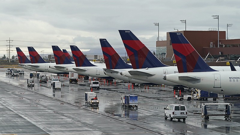 Delta planes are shown at their gates on Monday at Salt Lake City International Airport. Airlines' officials from around the world say they were overwhelmed by the demand for flights as countries reopened borders and covid-19 curbs started to fall away.
(AP/Rick Bowmer)