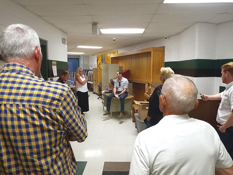 Peter Endres, development director with Ranger Power, answers questions from residents outside a North Callaway School Board meeting Thursday. (Michael Shine/FULTON SUN)