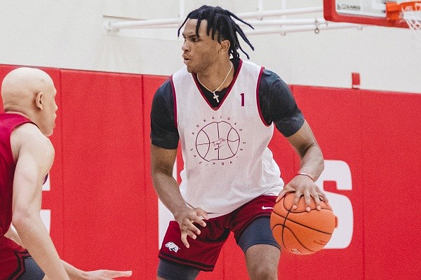 Arkansas wing Ricky Council looks to make a play on June 9, 2022, during a practice at the Razorbacks' practice facility in Fayetteville.