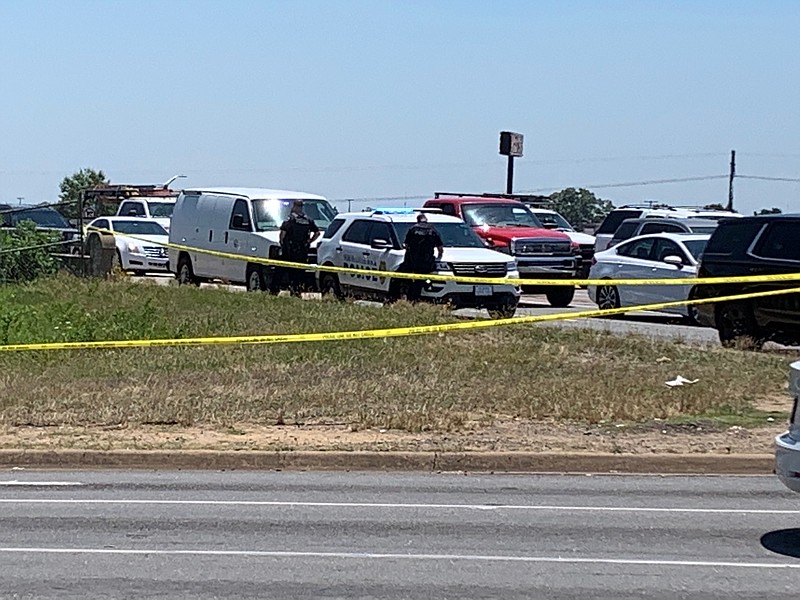 North Little Rock police officers found a dead body on the McCain Boulevard and Warden Road intersection. (Arkansas Democrat-Gazette/Stanton Breidenthal)
