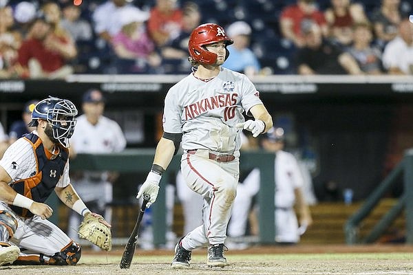 Arkansas first baseman Peyton Stovall bats during a College World Series game against Auburn on Tuesday, June 21, 2022, in Omaha, Neb.