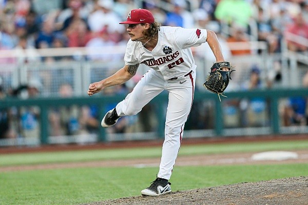 Arkansas Elijah Trest (20) pitches, Monday, June 20, 2022 during the fifth inning of a NCAA College World Series double elimination game at Charles Schwab Field in Omaha, Neb. Visit nwaonline.com/220621Daily/ for the photo gallery.