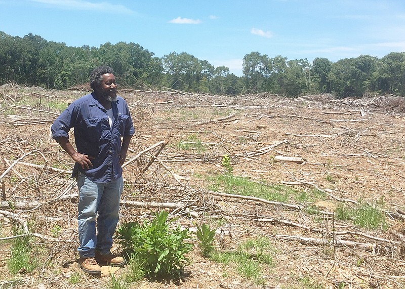Charley Williams, veteran soil conservationist at the Natural Resources Conservation Service, conducts a site visit for a landowner who received federal funding for planting timber. 
(Special to The Commercial/University of Arkansas at Pine Bluff)