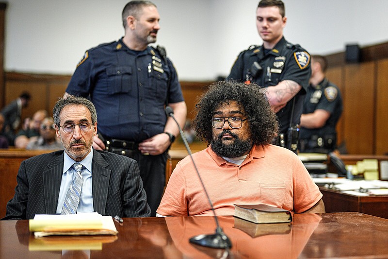 Richard Rojas (right) appears in court Wednesday, with his attorney Enrico DeMarco, as he waits for the verdict on his trial, in New York.
(AP/Daily Mail/Curtis Means)