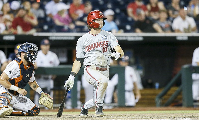 Arkansas infielder Peyton Stovall (10) bats, Tuesday, June 21, 2022 during the ninth inning of a NCAA College World Series elimination game at Charles Schwab Field in Omaha, Neb. Visit nwaonline.com/220622Daily/ for today's photo gallery...(NWA Democrat-Gazette/Charlie Kaijo)
