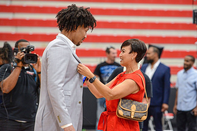 Former University of Arkansas forward Jaylin Williams speaks with his mother, Linda Williams, on Thursday before an NBA Draft watch party inside Northside Arena in Fort Smith. Williams was chosen by the Oklahoma City Thunder in the second round.
(NWA Democrat-Gazette/Hank Layton)