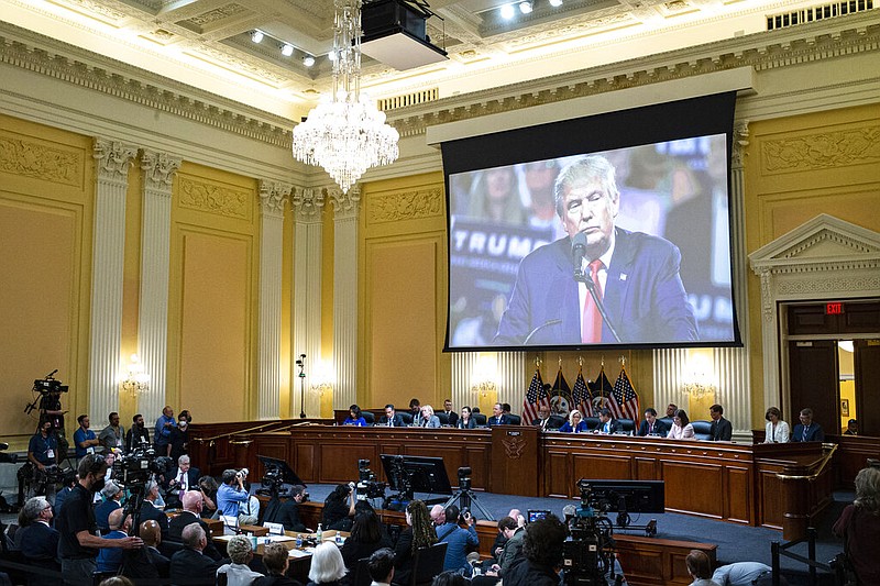 An image of former President Donald Trump is displayed as the House select committee investigating the Jan. 6 attack on the U.S. Capitol continues to reveal its findings of a year-long investigation, at the Capitol in Washington, Tuesday, June 21, 2022. (Al Drago/Pool Photo via AP)