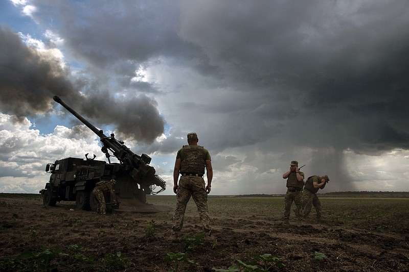 Ukrainian soldiers fire a self-propelled howitzer donated by France at a Russian position in the Donetsk region of eastern Ukraine on Friday.
(The New York Times/Tyler Hicks)