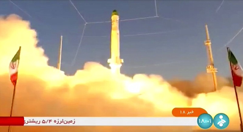 In this frame grab from video footage released Sunday, June 26, 2022 by Iran state TV, IRINN, shows an Iranian satellite-carrier rocket, called “Zuljanah,” blasting off from an undisclosed location in Iran. (IRINN via AP)