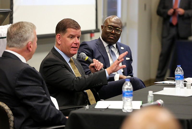 U.S. Secretary of Labor Marty Walsh (center) speaks as Little Rock Mayor Frank Scott Jr. (right) listens during a visit to Philander Smith College on Wednesday.
(Arkansas Democrat-Gazette/Thomas Metthe)