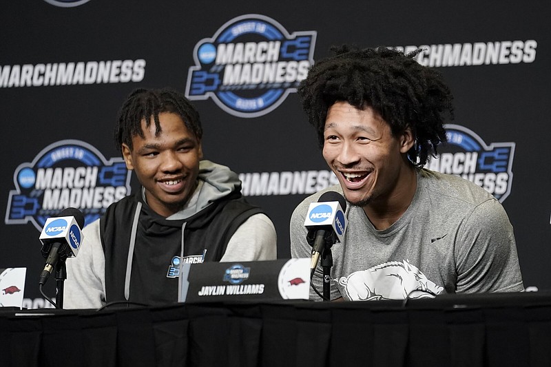 Arkansas' Jaylin Williams, right, and JD Notae speak at a news conference for the NCAA men's college basketball tournament in San Francisco, Wednesday, March 23, 2022. Arkansas faces Gonzaga in a Sweet 16 game on Thursday. 
(AP Photo/Jeff Chiu)