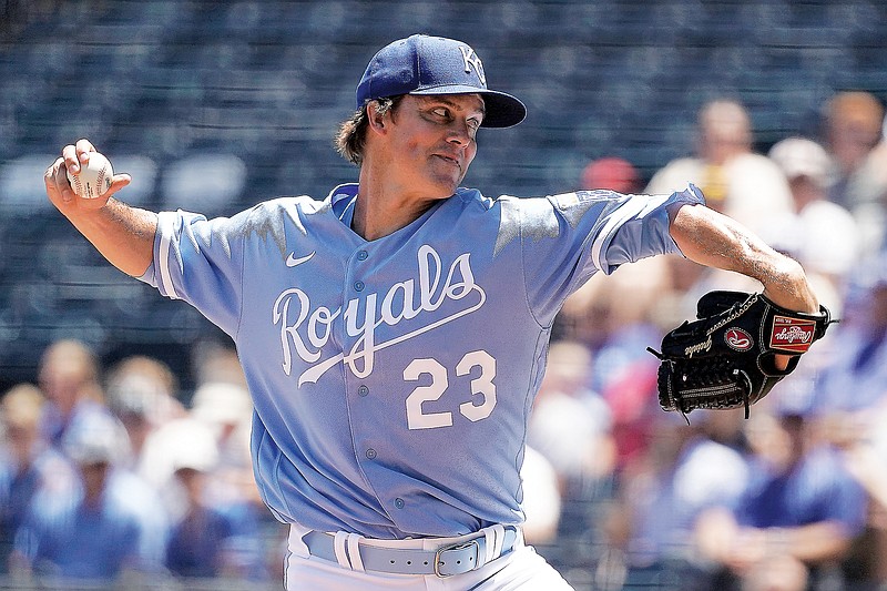 Royals starting pitcher Zack Greinke throws to the plate during Wednesday afternoon’s game against the Rangers at Kauffman Stadium. (Associated Press)