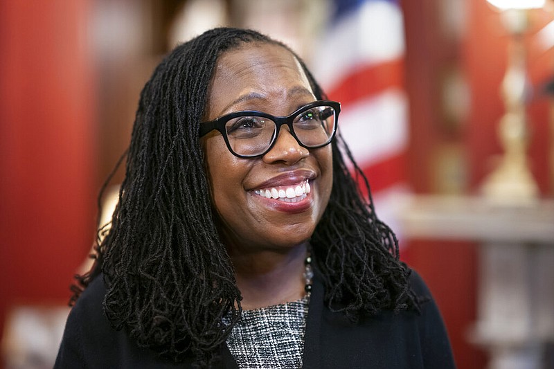 FILE - Supreme Court nominee Judge Ketanji Brown Jackson smiles as Sen. Richard Shelby, R-Ala., arrives for a meeting in his office on Capitol Hill in Washington, March 31, 2022. The first Black woman confirmed for the Supreme Court, Jackson, is officially becoming a justice. Jackson will be sworn as the courtâ€™s 116th justice at midday Thursday, June 30, just as the man she is replacing, Justice Stephen Breyer, retires. (AP Photo/J. Scott Applewhite, File)