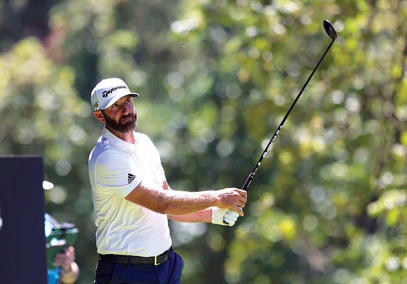 Dustin Johnson watches his tee shot on the fourth hole during Thursday’s first round of the Portland Invitational LIV Golf event in North Plains, Ore. (Associated Press)