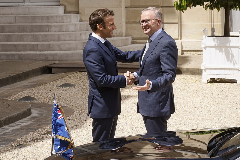 French President Emmanuel Macron (left) welcomes Australian Prime Minister Anthony Albanese to the French presidential palace Friday in Paris.
(AP/Thomas Padilla)