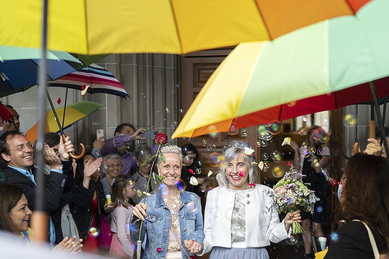 Annett Babinsky (left) and Laura Suarez celebrate their marriage on Friday at the registry office in Zurich, Switzerland.
(AP/Keystone/Ennio Leanza)