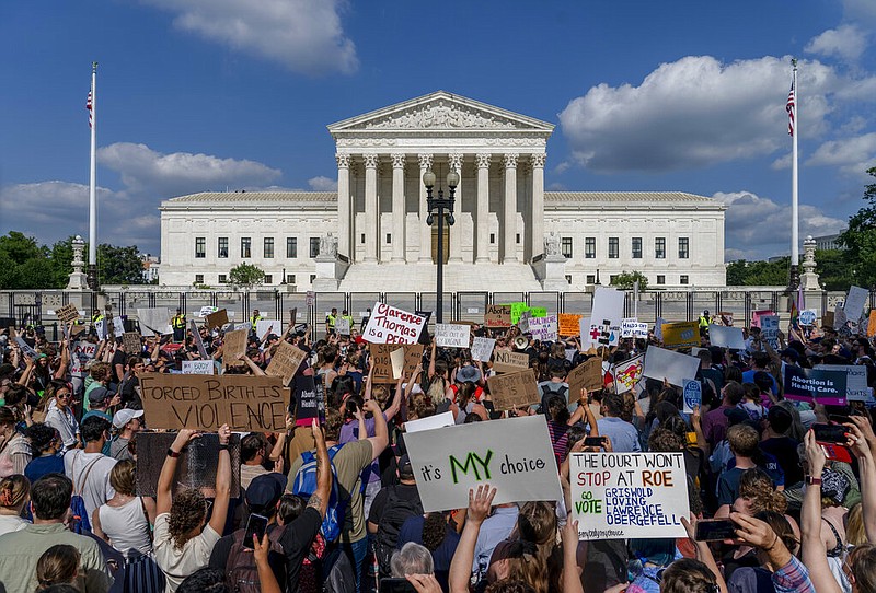 Abortion-rights and anti-abortion demonstrators gather outside of the Supreme Court in Washington, Friday, June 24, 2022. (AP Photo/Gemunu Amarasinghe, File)