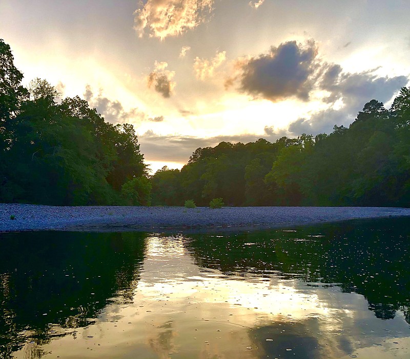 A brilliant sunset capped a superb day of fishing Sunday on the Caddo River.
(Arkansas Democrat-Gazette/Bryan Hendricks)