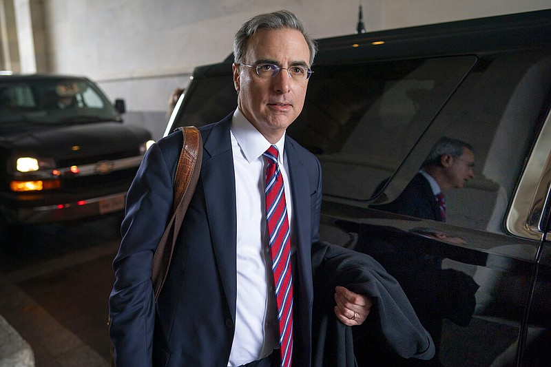 FILE - White House counsel Pat Cipollone departs the U.S. Capitol following defense arguments in the impeachment trial of President Donald Trump on charges of abuse of power and obstruction of Congress, in Washington, Saturday, Jan. 25, 2020. (AP/J. Scott Applewhite, File)