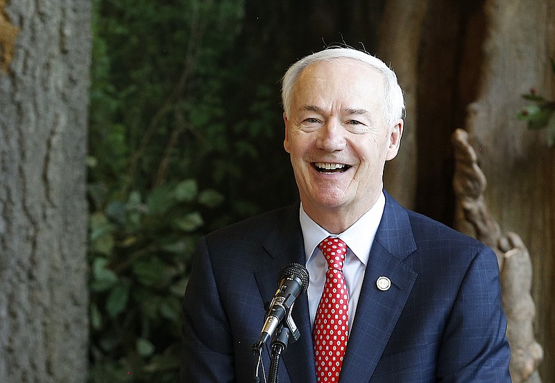 Gov. Asa Hutchinson, speaking Wednesday, July 6, 2022, at the Witt Stephens Nature Center in Little Rock, said that “the core of the special session, the reason it is called, is to provide the tax relief” and that raises for teachers would be addressed later. (Arkansas Democrat-Gazette/Thomas Metthe)
