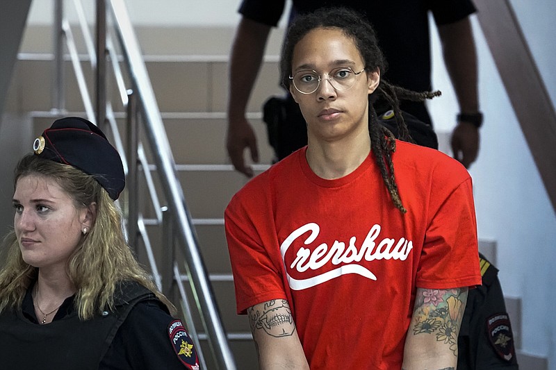 WNBA star and two-time Olympic gold medalist Brittney Griner is escorted to a courtroom Thursday for a hearing in Khimki, Russia, just outside Moscow. Griner pleaded guilty to drug possession charges on the second day of her trial in a case that could see her sentenced to up to 10 years in prison.
(AP/Alexander Zemlianichenko)
