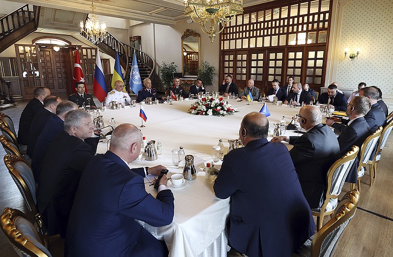 Delegations from Russia (left) and Ukraine (top right) meet Wednesday in Istanbul with United Nations observers (right) and Turkish Defense Ministry officials.
(AP/Turkish Defense Ministry)