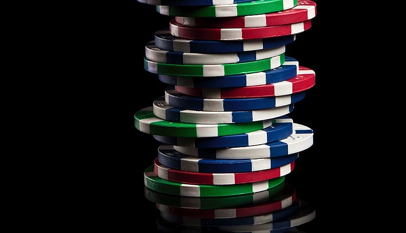 poker chips isolated on a black background