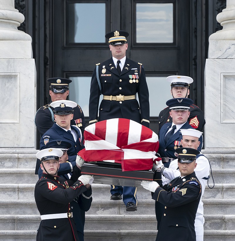 A joint service honor guard carries the casket bearing the remains of Hershel W. “Woody” Williams out of the U.S. Capitol on Thursday after the hero of Iwo Jima lay in honor in the rotunda.
(AP/J. Scott Applewhite)