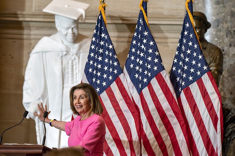 House Speaker Nancy Pelosi, D-Calif., speaks Wednesday in front of a statue of civil rights leader and trailblazing educator Mary McLeod Bethune, during a ceremony in honor of Bethune in Statuary Hall at the U.S. Capitol in Washington.
(AP/Jacquelyn Martin)