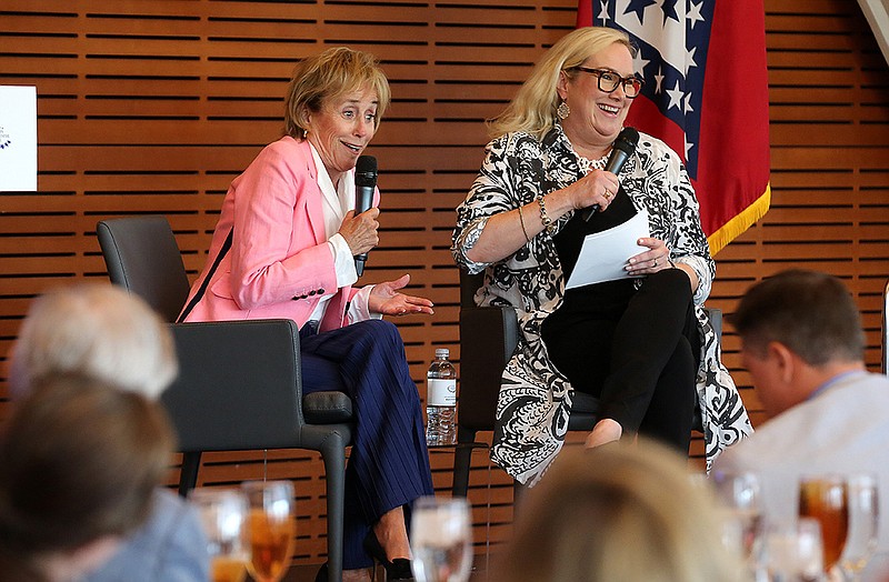 Valerie Biden Owens (left) tells a story about her brother, President Joe Biden, and her time as his campaign manager while speaking to the Little Rock Rotary Club on Tuesday, July 19, 2022, at the Clinton Presidential Library in Little Rock. .(Arkansas Democrat-Gazette/Thomas Metthe)