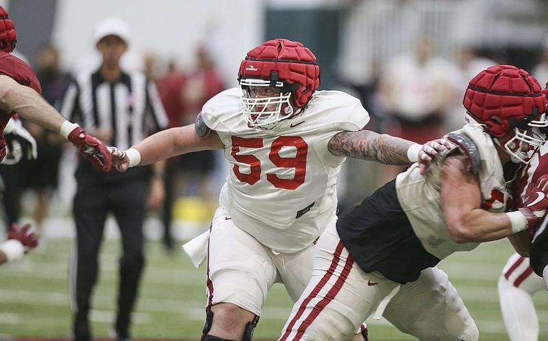 Arkansas freshman offensive lineman Eli Henderson was originally offered a scholarship by then-Georgia offensive line coach Sam Pittman as a 16-year-old. Henderson eventually picked Pittman and Arkansas over the Bulldogs.
(NWA Democrat-Gazette/Charlie Kaijo)