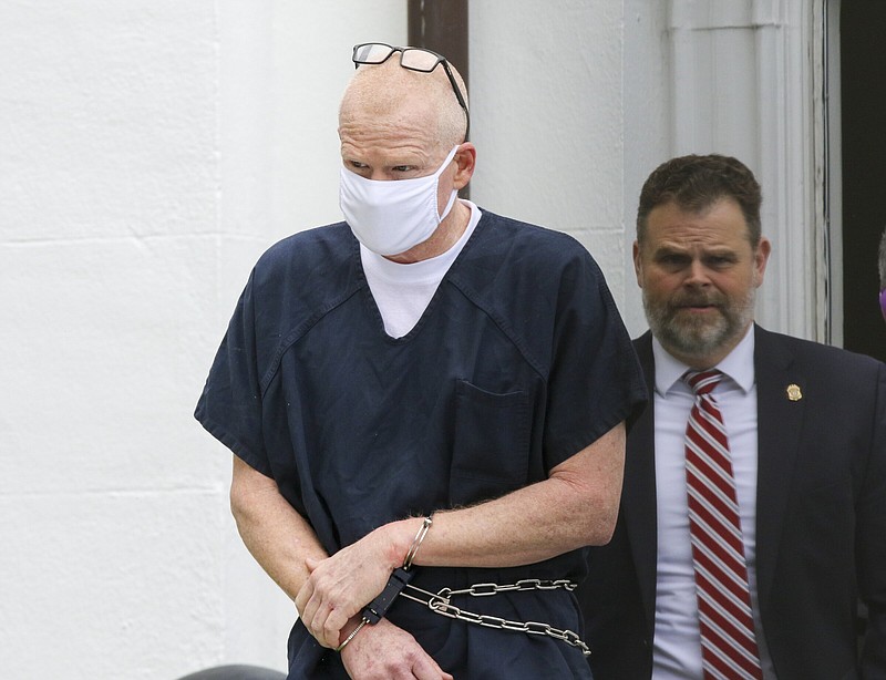 Alex Murdaugh is escorted out of the Colleton County Courthouse Wednesday in Walterboro, S.C.
(AP/The State/Tracy Glantz)