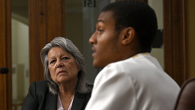 N'Nandi Islam, a Senior at Southwest High School, talks with Cheryl May, Chair of the Arkansas School Safety Commission, during a commission meeting at the Arkansas State Capitol on Tuesday, July 19, 2022. Several high schoolers talked about their experiences with shooting drills, school safety officers, and other topics during the meeting...(Arkansas Democrat-Gazette/Stephen Swofford)