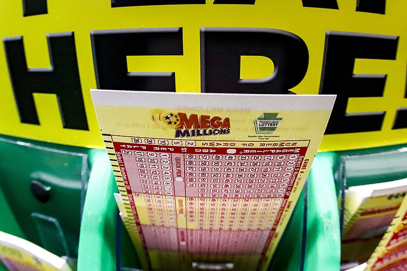 A Mega Millions play-slip sits in a lottery game bin in Cranberry Township, Pa. The game has gone without a winner for three months, and the jackpot for Friday’s drawing has grown to $660 million as of Thursday.
(AP/Keith Srakocic)