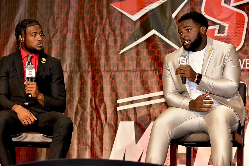 UAPB quarterback Skyler Perry (left) and left tackle Mark Evans II talk with ESPN personalities (not pictured) at SWAC Media Day on Thursday, July 21, 2022, in Birmingham, Ala. (Pine Bluff Commercial/I.C. Murrell)