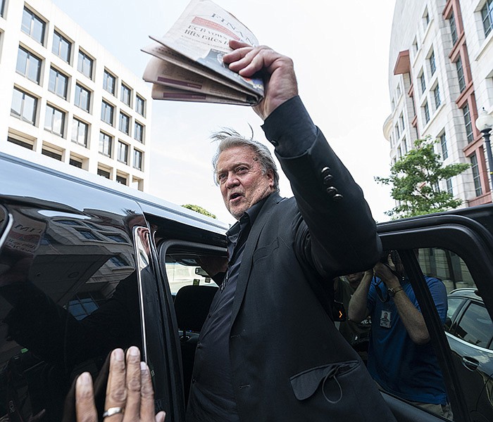 Steve Bannon waves to the crowd as he leaves federal court Friday
in Washington. “We may have lost the battle here today. We’re not
going to lose this war,” he said.
(AP/Alex Brandon)