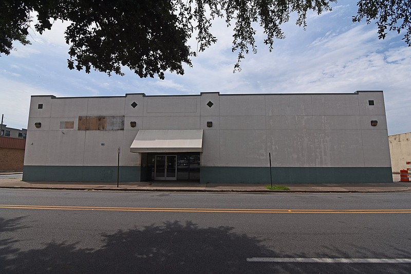 The former Greyhound Bus Station on East Washington Avenue in North Little Rock, about a block southwest of Simmons Bank Arena, sits empty Wednesday, July 20, 2022. (Arkansas Democrat-Gazette/Staci Vandagriff)