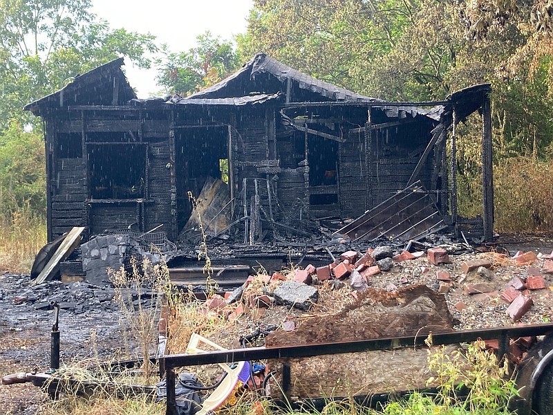 A house at 2307 W. 11th Ave. stands charred Wednesday, July 27, 2022, one day after a blaze at the home. The body of an unidentified person was found dead in the remains. (Pine Bluff Commercial/Byron Tate)