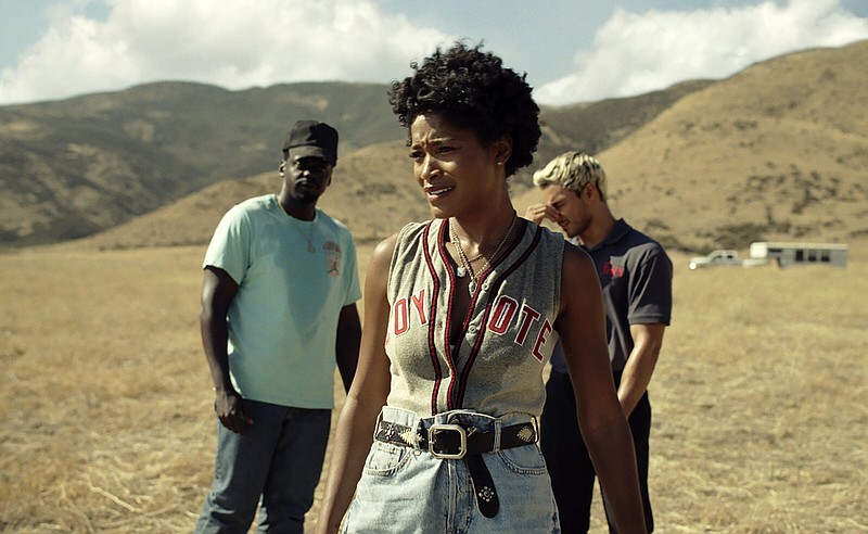 Daniel Kaluuya (from left), Keke Palmer, and Brandon Perea appear in a scene from “Nope.”
(Universal Pictures via AP)